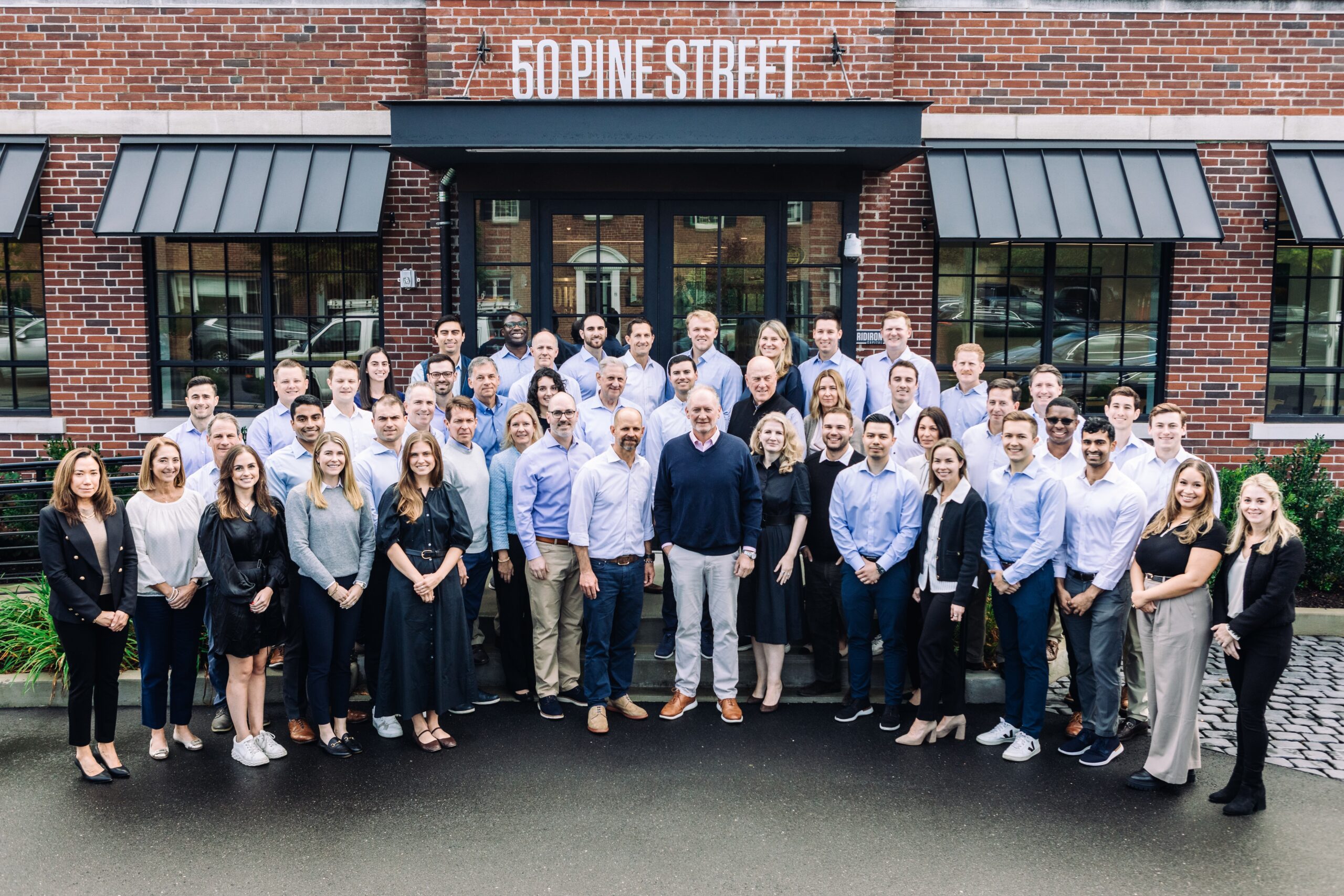 Team Photo in Front of Office