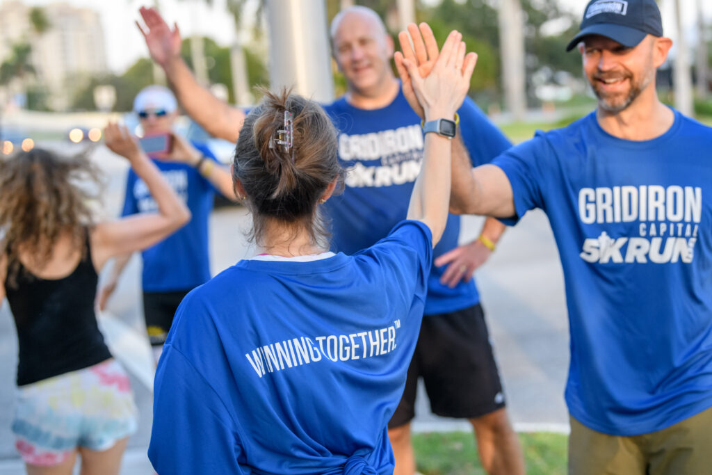 High Fives at Race Event