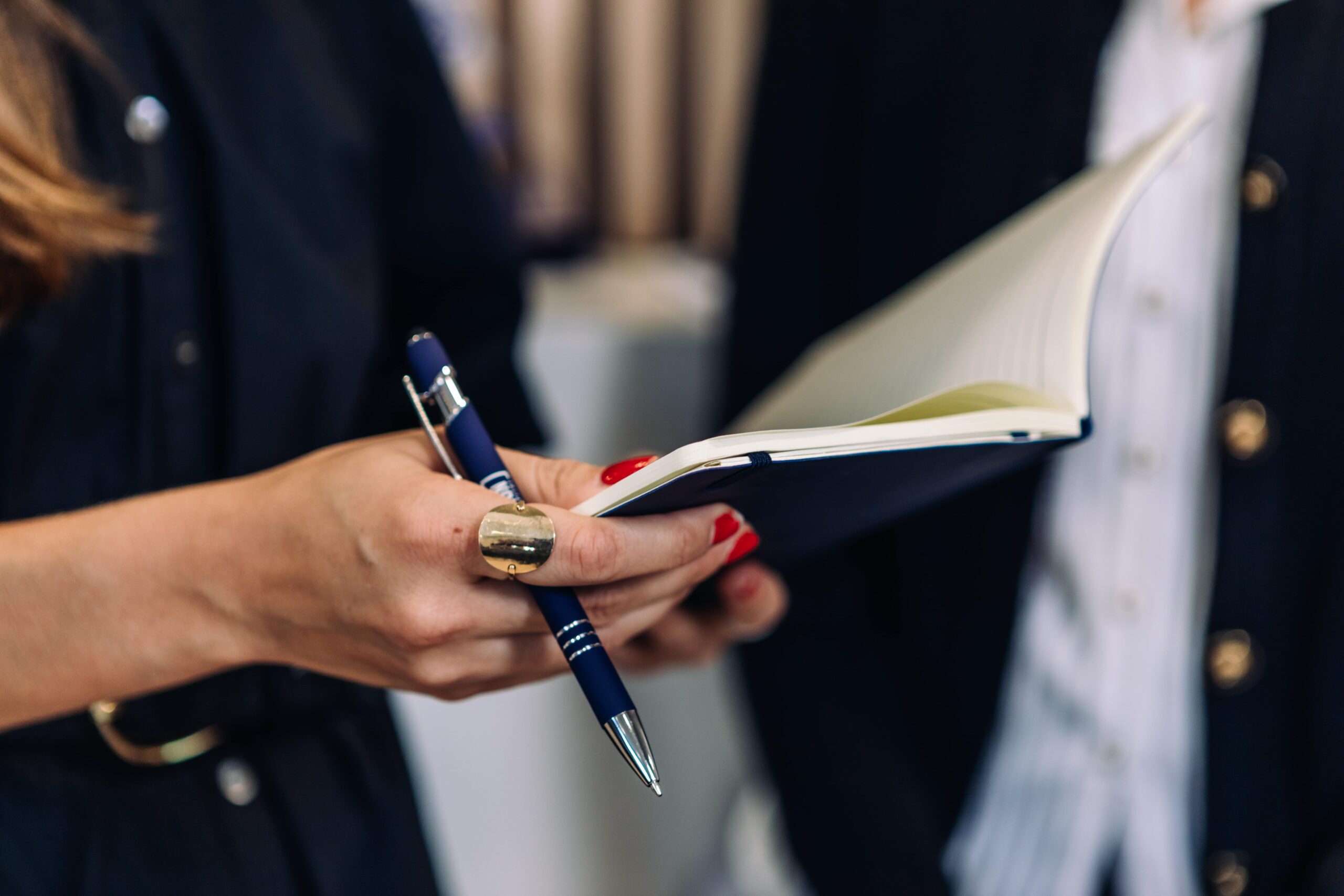 Woman Holding Notebook