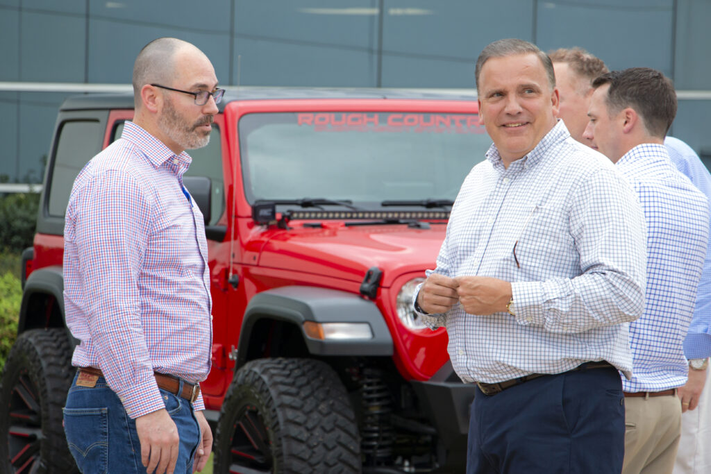 Men in Front of Jeep