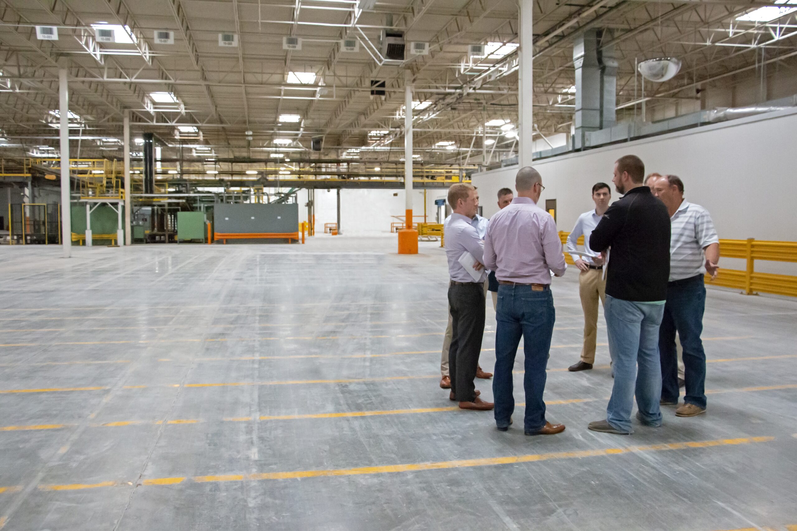 Men in Empty Warehouse