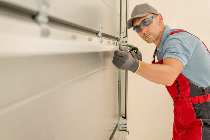 Man Working on Garage Door